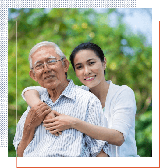 A woman and an old man are hugging.